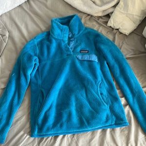 Blue Patagonia quarter button up. Good quality and in good condition.